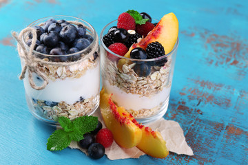 Healthy breakfast - yogurt with  fresh fruit, berries and