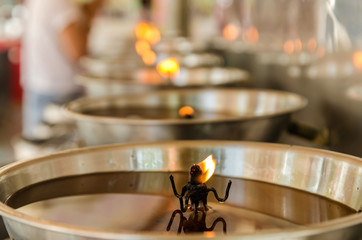Burning candles in temple