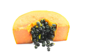 sliced papaya wiht seed on white background