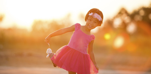 Asia Little girl at sunset