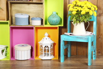Beautiful colorful shelves with different home related objects