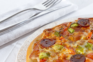 delicious pizza and silverware