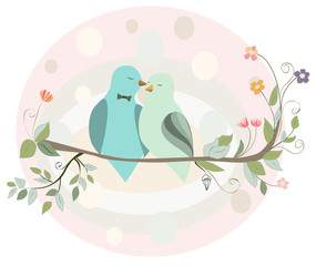 Couple of birds in love on a branch