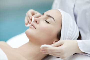 spa, resort, beauty and health concept - beautiful woman in spa  - 74063595