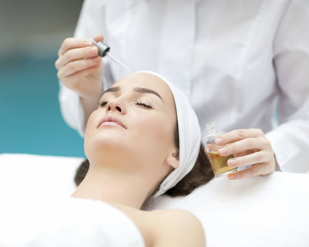 spa, resort, beauty and health concept - beautiful woman in spa 