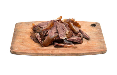 Roast beef on cutting board isolated on white background