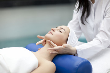 spa, resort, beauty and health concept - beautiful woman in spa 