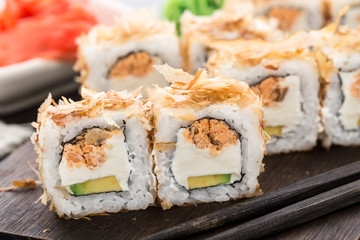 Sushi rolls with salmon teriyaki