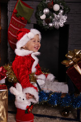 Fototapeta na wymiar laughing baby Santa Claus