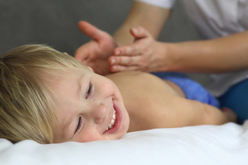 Obraz na płótnie Canvas funny little boy with a massage