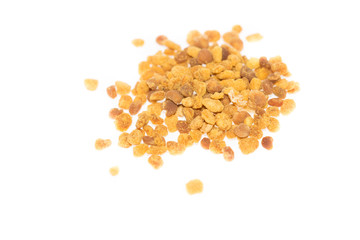 Top view of bee pollen against bright white background