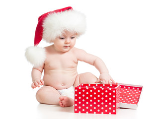 Baby in Santa hat with Christmas gift box isolated