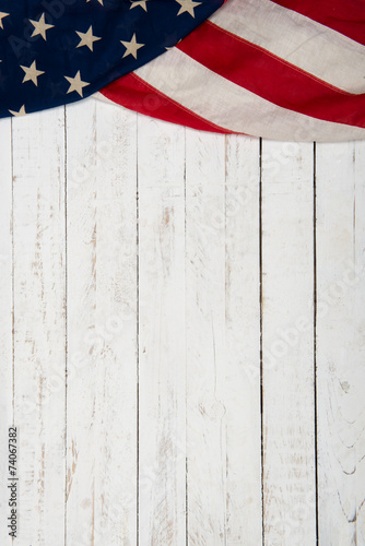 white wooden background with an American flag