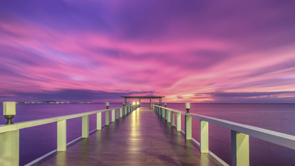 Landscape of Wooded bridge in the port between sunrise
