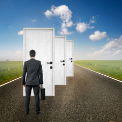 Fototapeta premium man standing in front of door on the Road