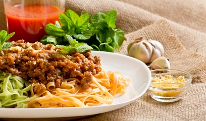 Fotobehang Spaghetti bolognese on sackcloth © julia_arda