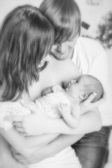 Eltern mit Baby Schwarz Weiss