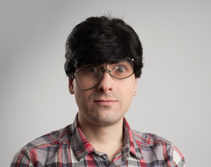 strange man with broken glasses