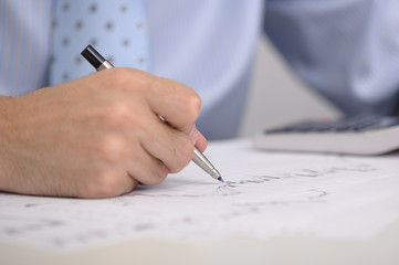 male hand with pen