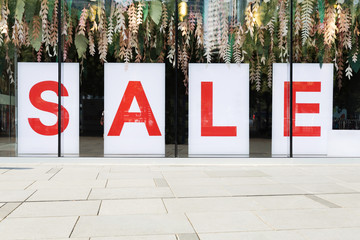 sale poster in the fashion shopfront