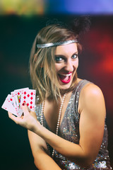 woman playing poker with scale