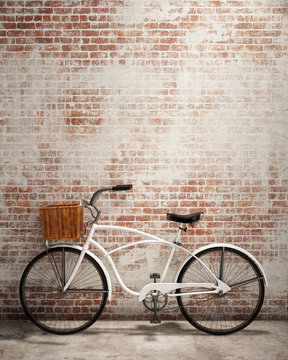 retro hipster bicycle in front of the old brick wall, background