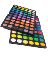 Palette of colorful eye shadows isolated on white background