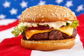 Cheeseburger with mayonnaise on USA flag