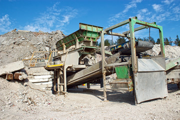 Fototapeta na wymiar Construction material crushing machine