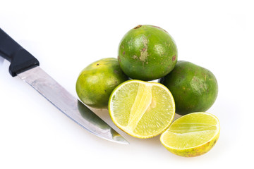 Limes on the white background