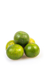 Limes on the white background