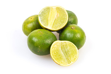 Limes on the white background