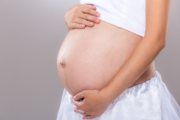 Body part of pregnant woman