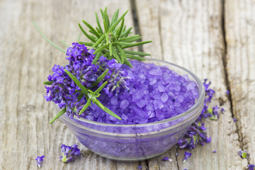 Fototapeta na wymiar bath salt, lavender flowers and rosemary
