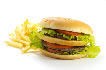 Big and tasty hamburger and fried potatoes isolated 