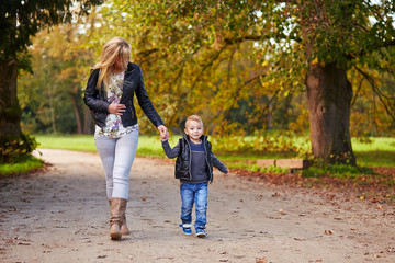 Fototapeta premium Mother goes along with his son