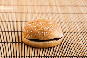hamburgers on wooden board.