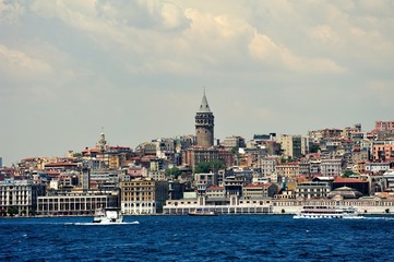 Naklejka na ściany i meble Galata Tower and Istanbul View with cludy sky
