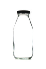 Empty glass bottle of milk with cap