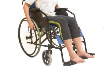 Obraz na płótnie Canvas A disabled woman posing in a wheelchair isolated
