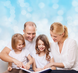 happy family with book at home