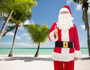 man in costume of santa claus showing thumbs up