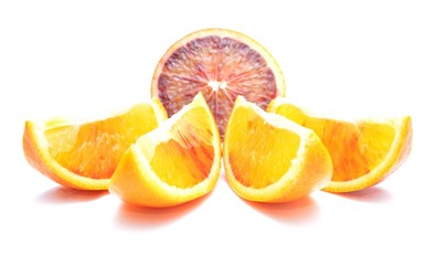 Slices of red oranges isolated on white background