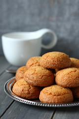 Heap of almond cookies on metal plate