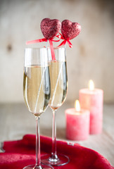 Glasses of champagne in candlelit on St Valentine's day