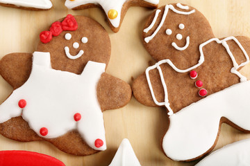 Christmas decorated gingerbread in shape of man and woman on the