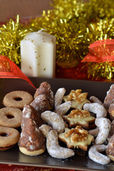 Decorated Christmas cookies on the brown plate