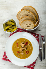 Pork stew and homemade bread and pickles