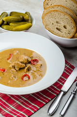 Pork stew and homemade bread and pickles