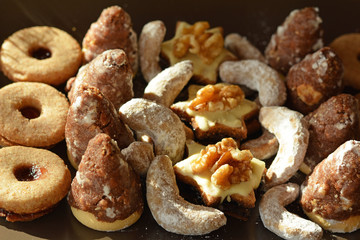 Decorated Christmas cookies on the brown plate